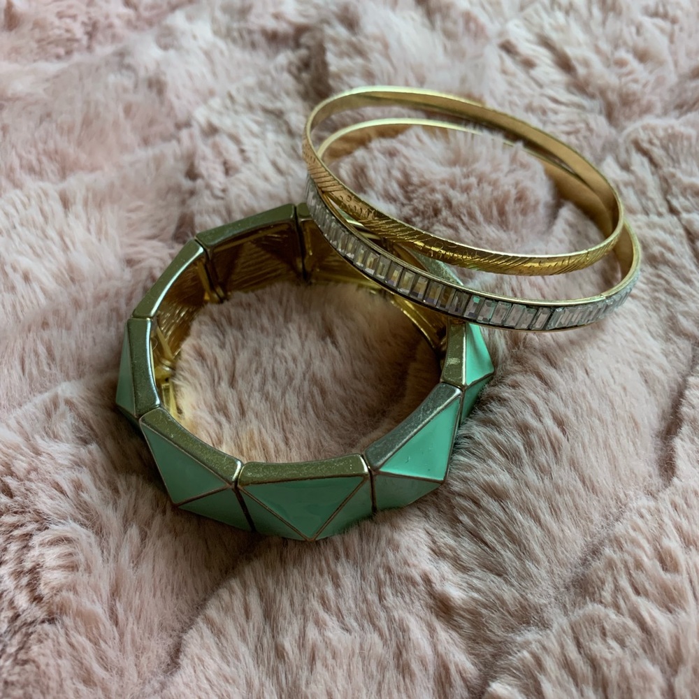 mint and gold set of bracelets